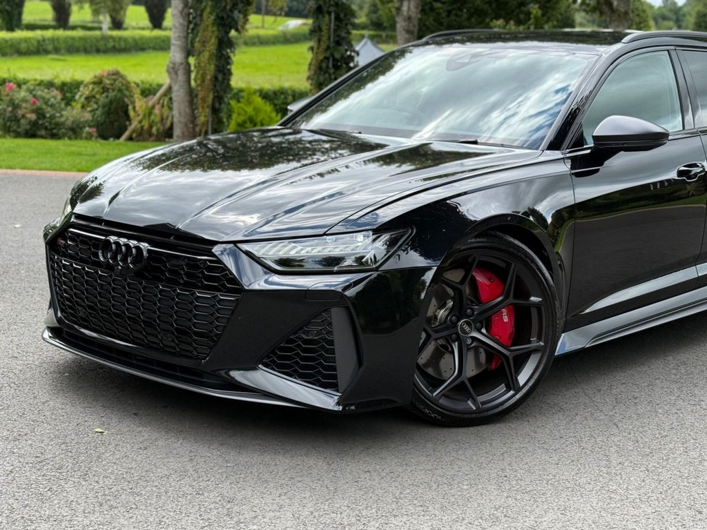 Glossy black Audi after detailing