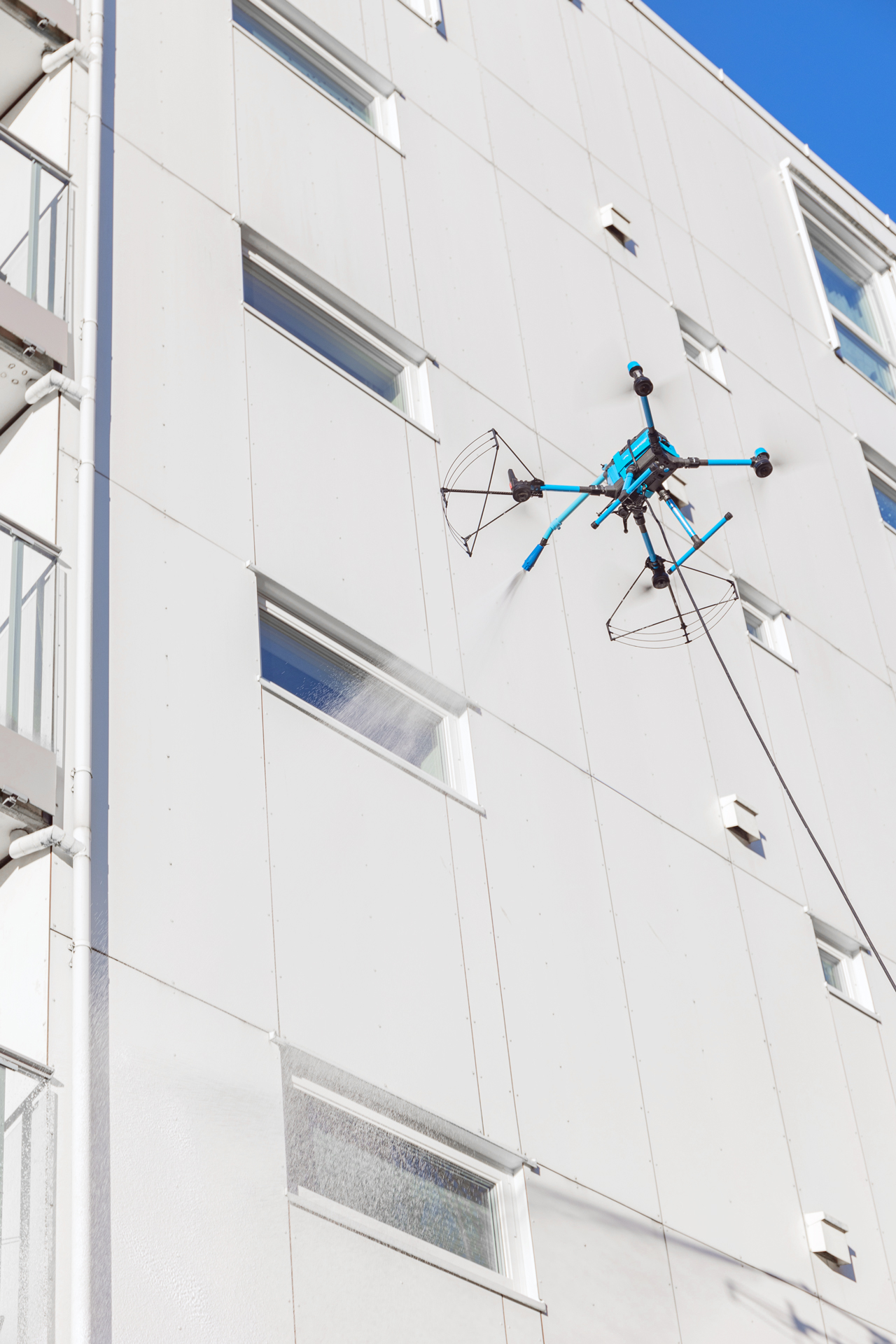 KTV Working Drone autonomous cleaning drone in action on building facade