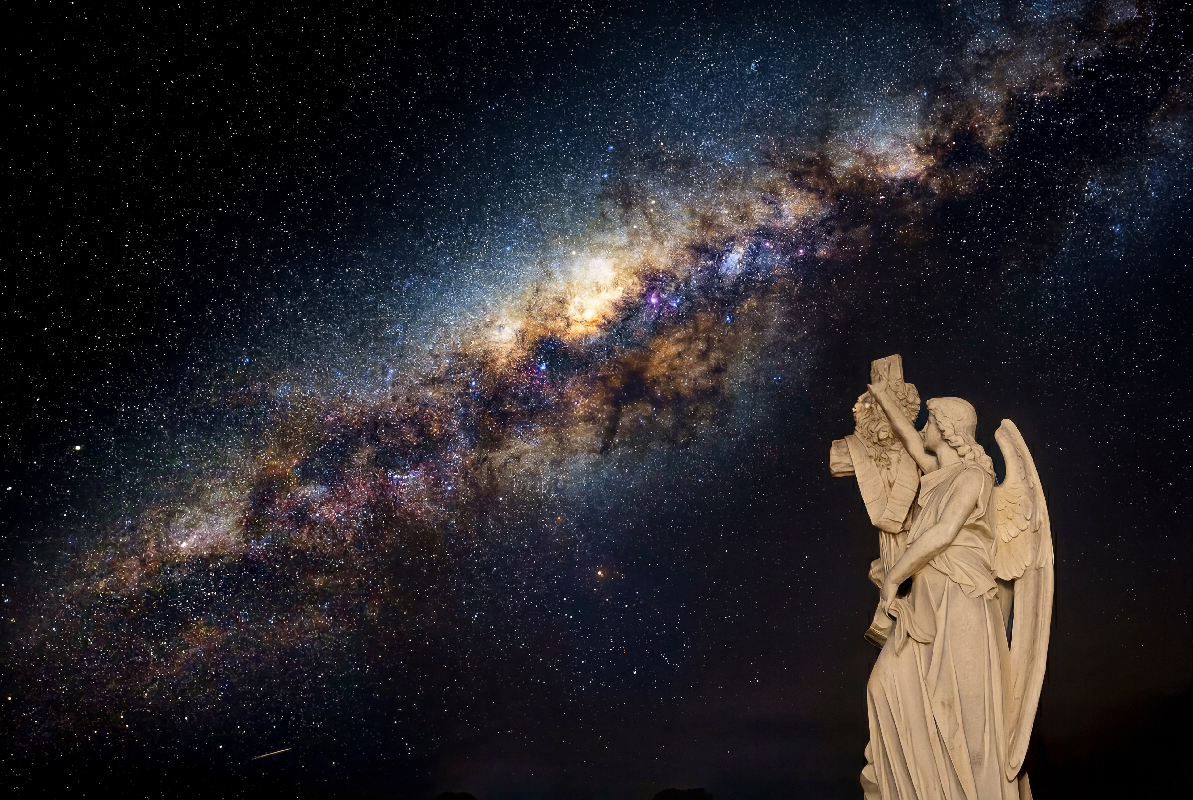 Cathedral of Stars — a statue gazing up at the Milky Way