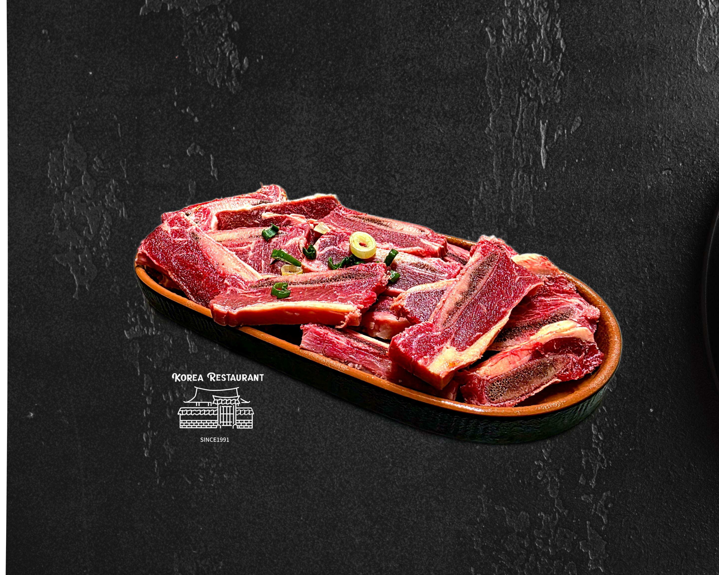 Fresh beef ribs garnished with spring onion