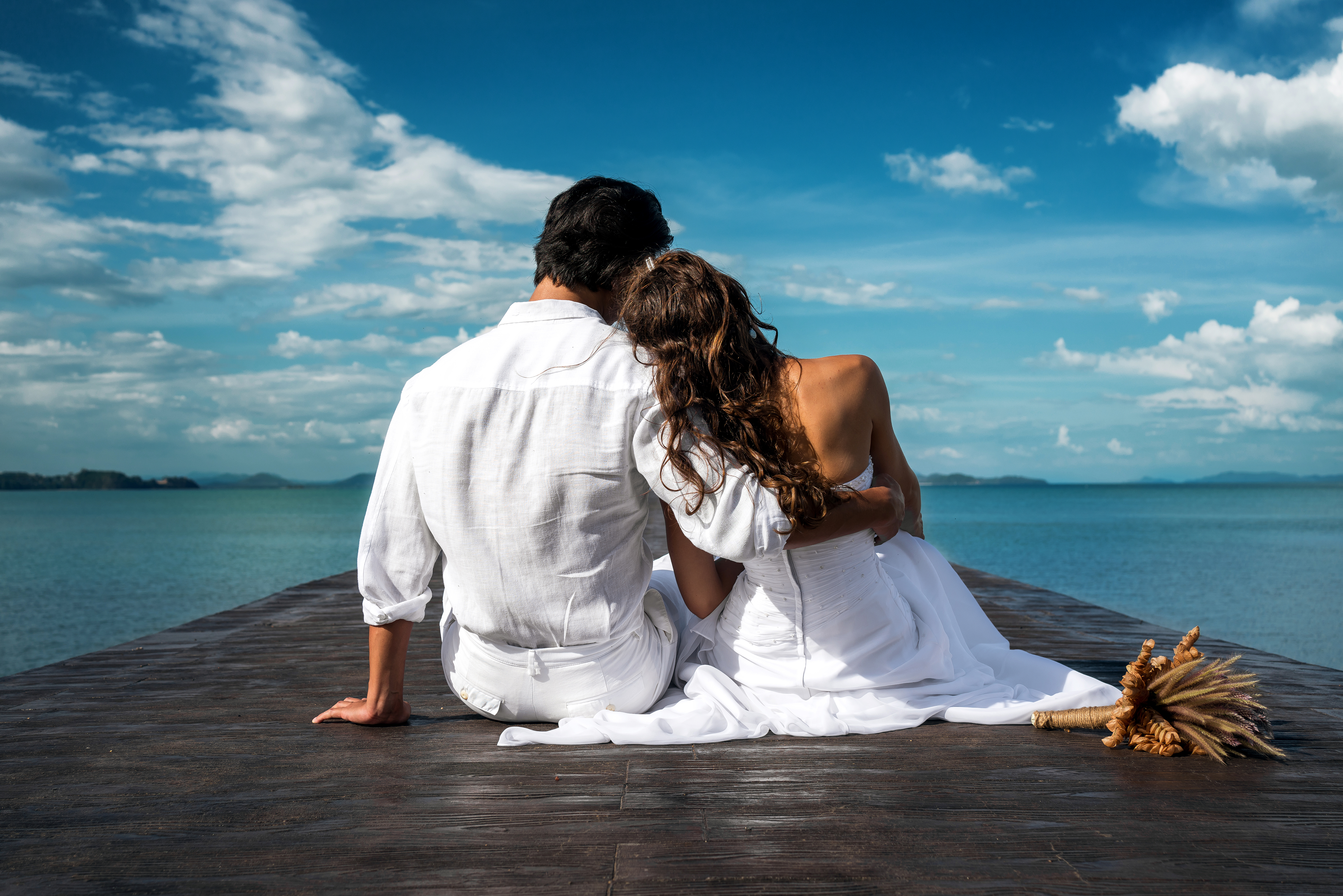 Couple on the pier at Island Escape