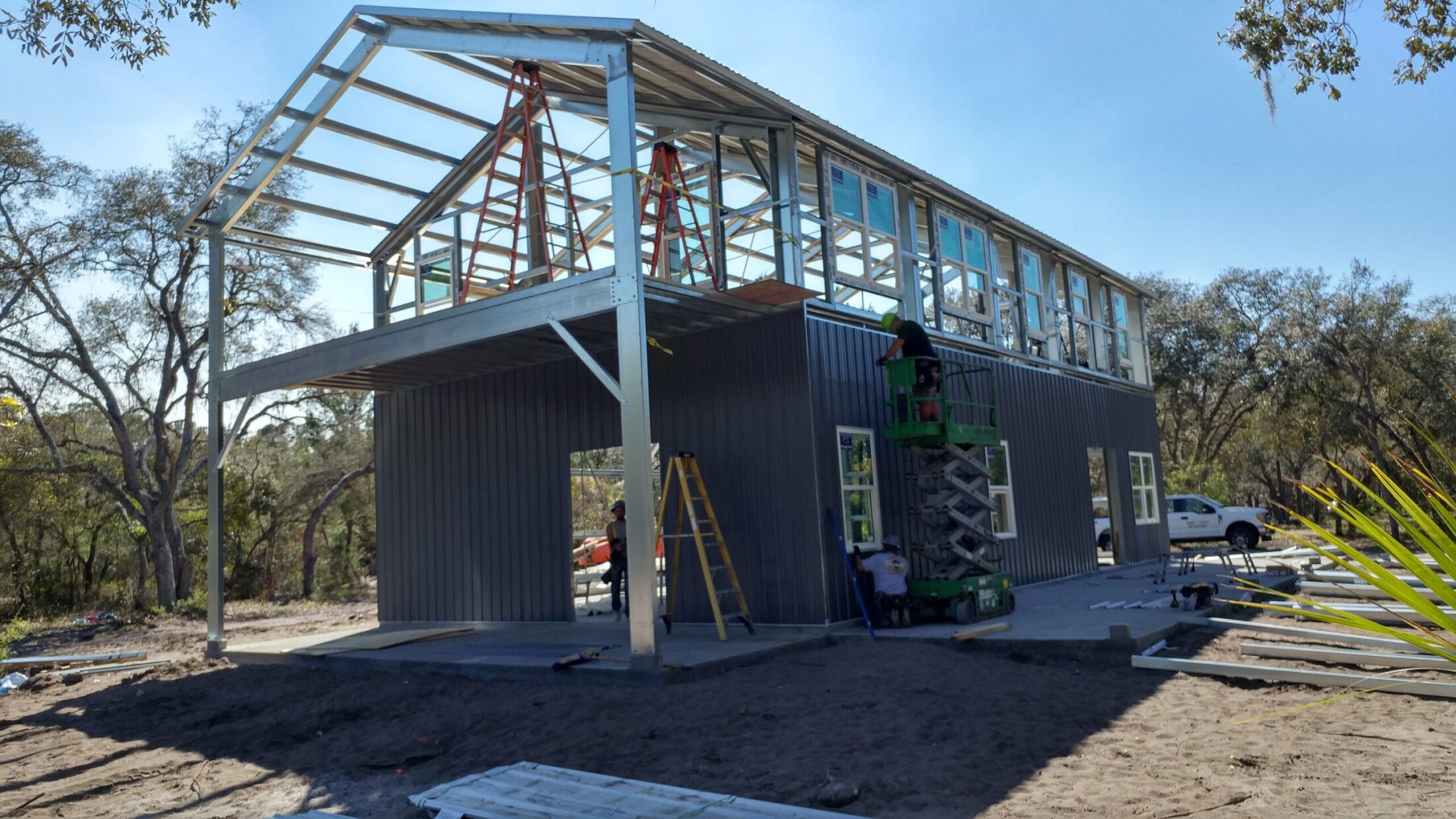Shed home steel portal frame under construction — framing system visible