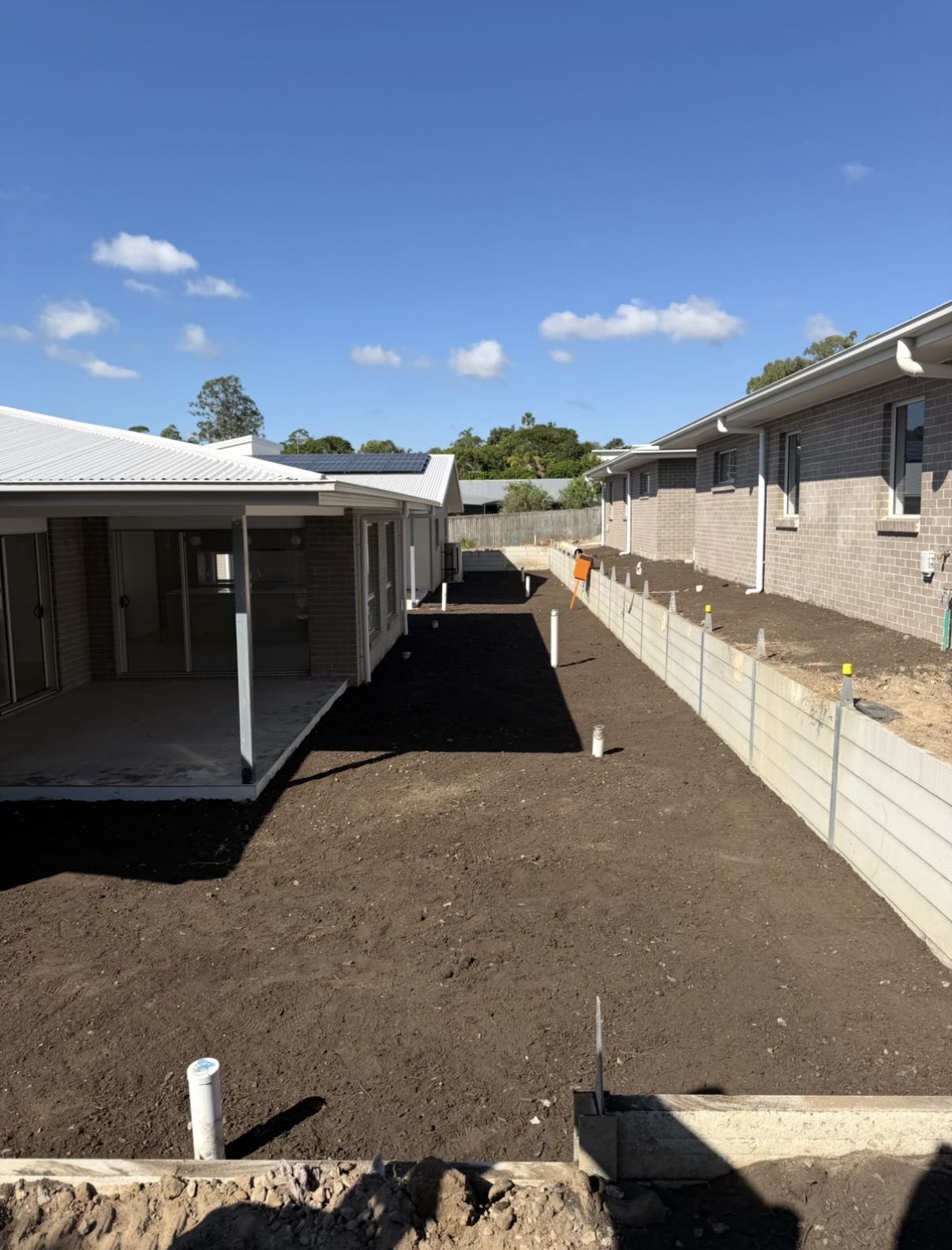 Backfill and site levelling between new builds on the Gold Coast