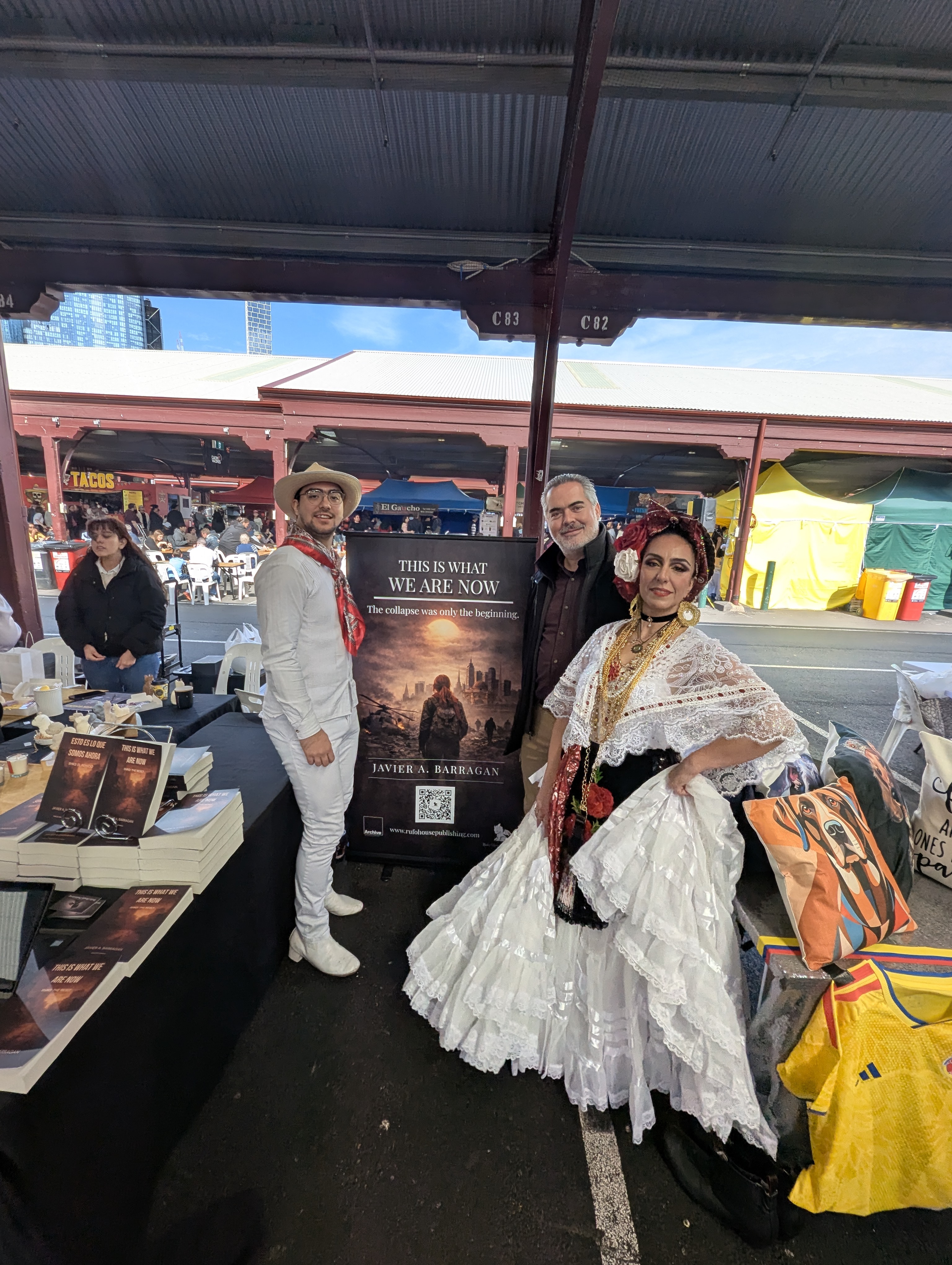With traditional dancers at the booth