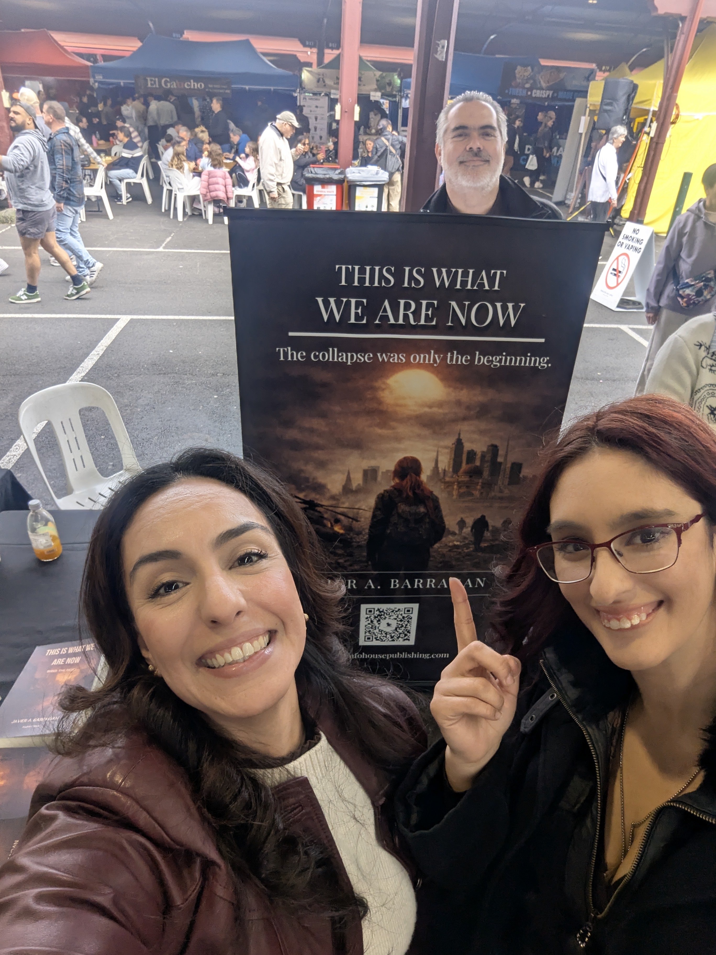 Fans with the book banner