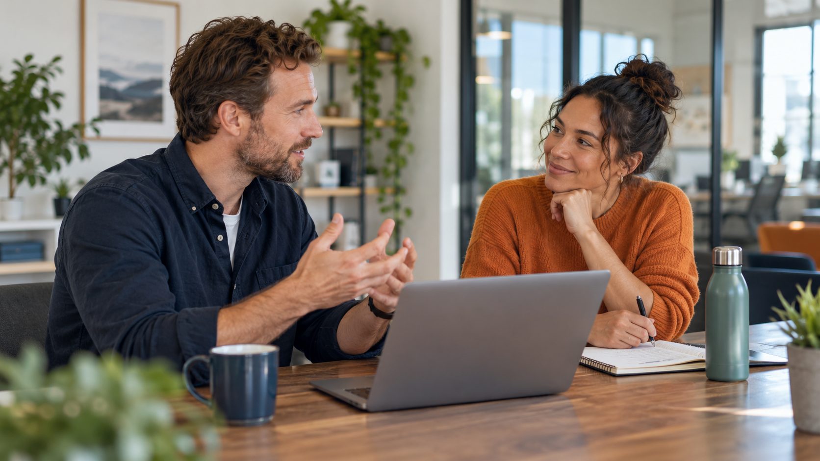 Manager and employee having a calm conversation about workplace expectations