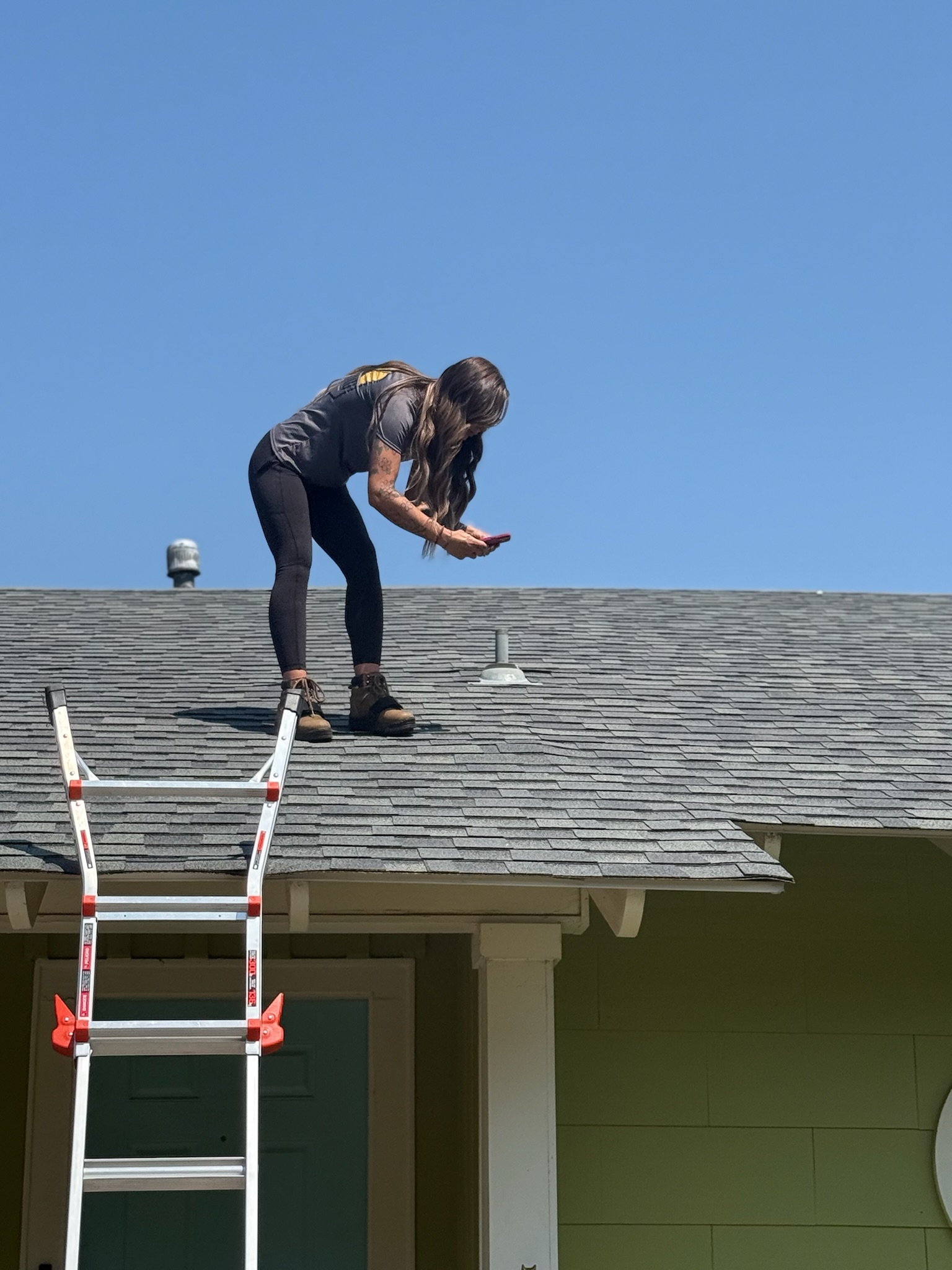 Taylor Thorne, woman-owned roofing contractor, conducting a detailed roof inspection in Dallas-Fort Worth