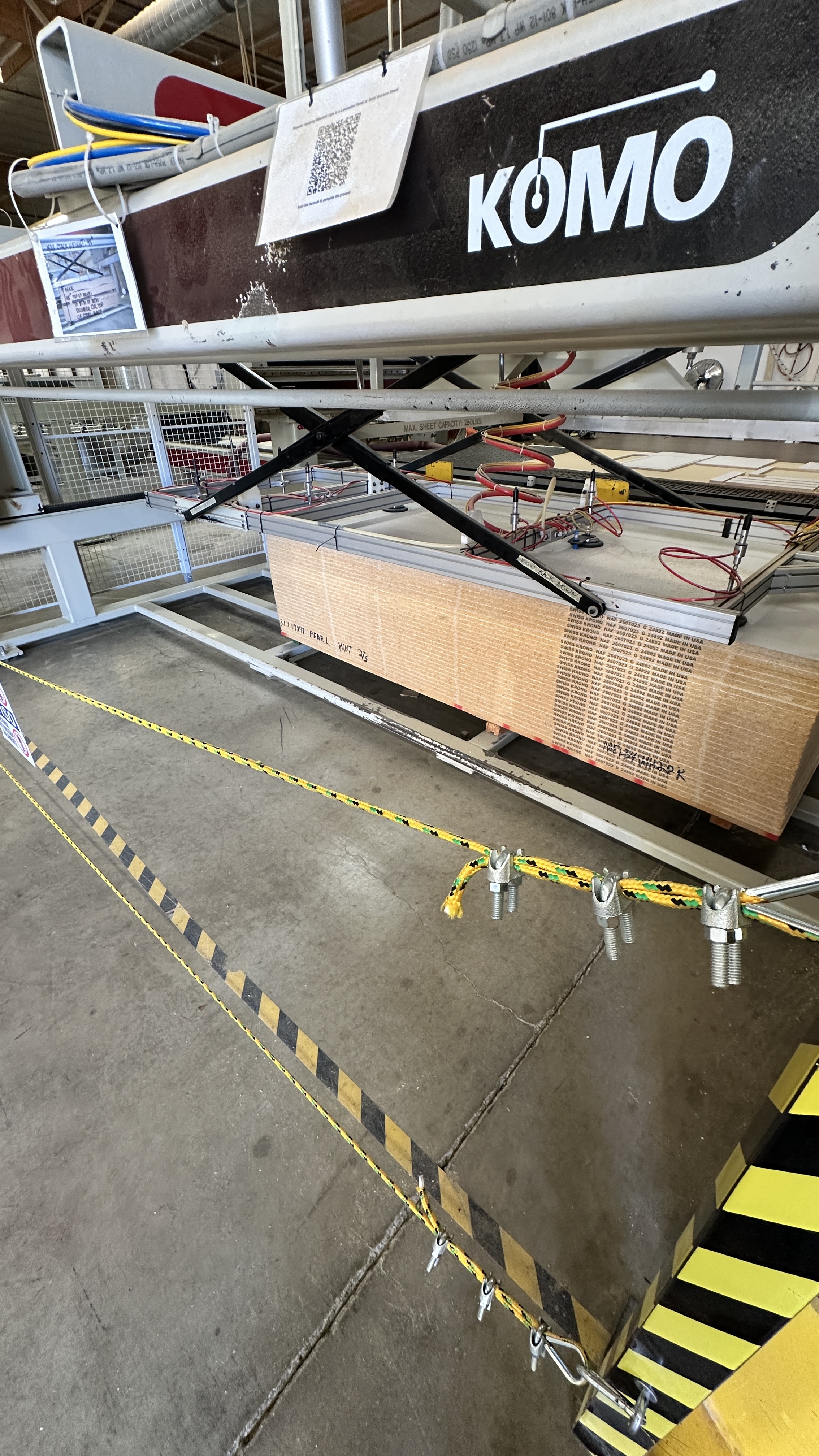 KOMO CNC nested-base router with scissor-lift material loading system in Oxnard shop