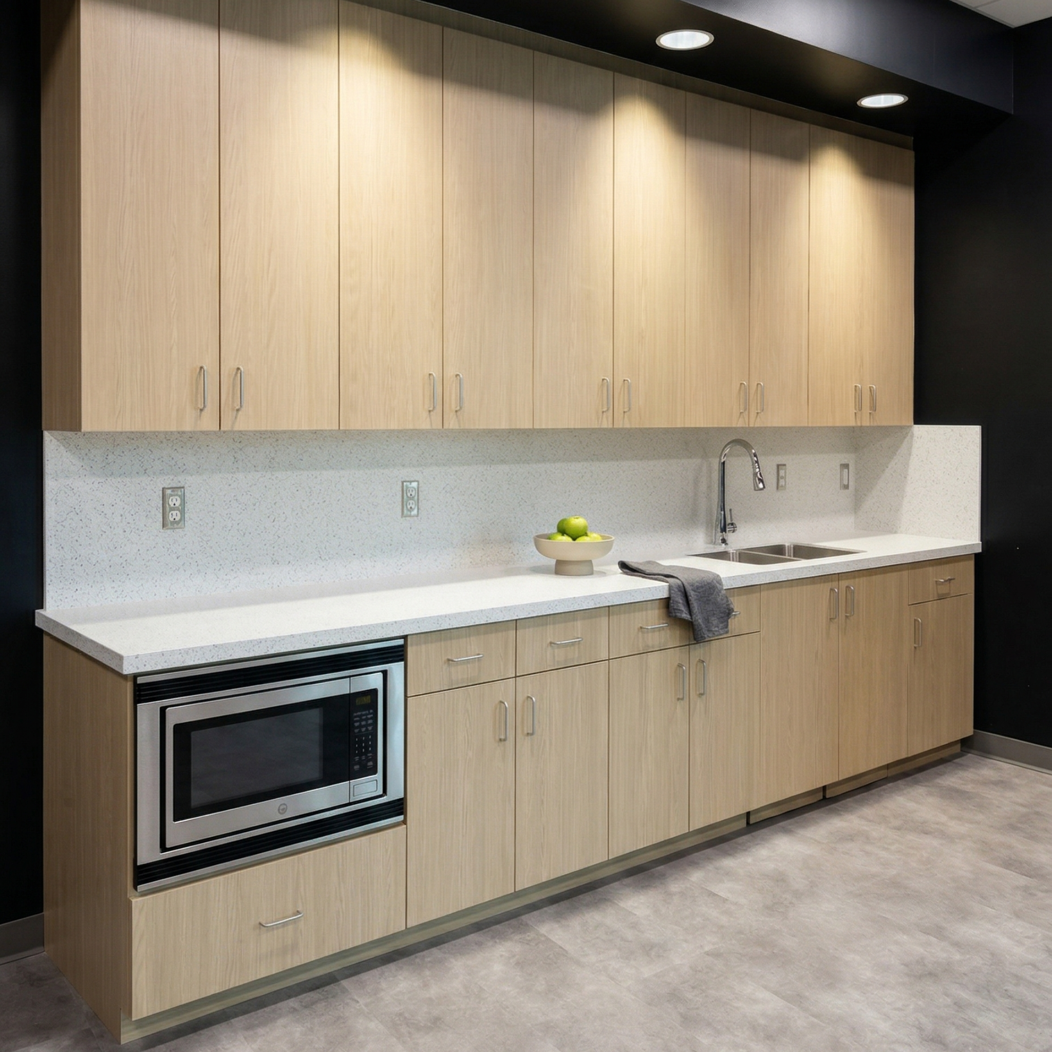 Maintenance facility kitchen cabinetry with Formica Aged Ash HPL and Wilsonart Avalanche Melange countertops in Port Hueneme CA